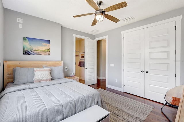1906 143rd Ct E, Bradenton, FL 34212 - bedroom featuring wood finished floors, a closet, and ceiling fan