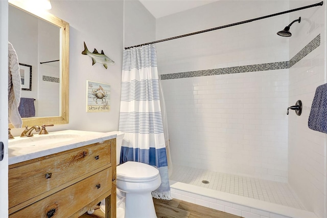 1906 143rd Ct E, Bradenton, FL 34212 - bathroom featuring tiled shower, vanity, and wood finished floors