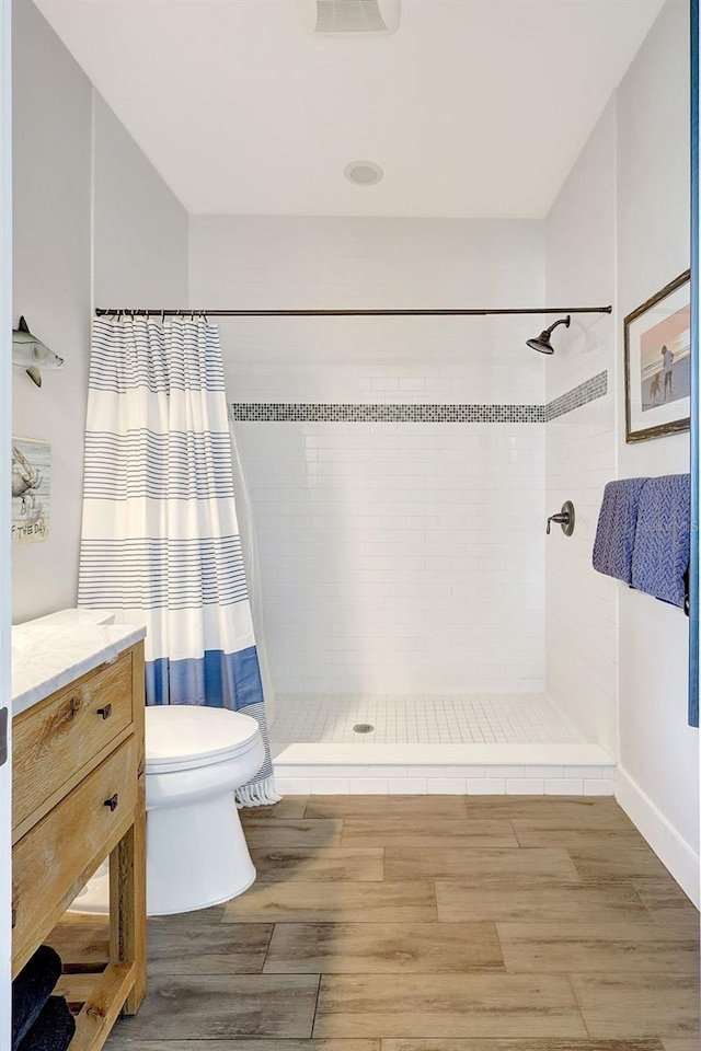1906 143rd Ct E, Bradenton, FL 34212 - full bath featuring wood finished floors, a tile shower, and vanity
