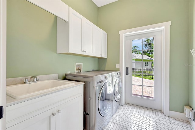 1906 143rd Ct E, Bradenton, FL 34212 - washroom with washing machine and clothes dryer and cabinet space