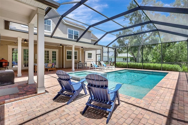 1906 143rd Ct E, Bradenton, FL 34212 - swimming pool featuring ceiling fan, a patio area, and glass enclosure