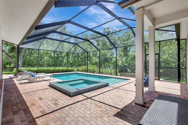 1906 143rd Ct E, Bradenton, FL 34212 - view of pool with a pool with connected hot tub, a patio, and glass enclosure