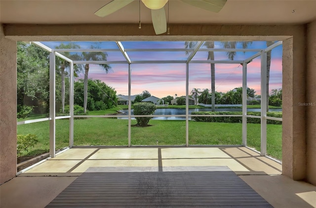 4539 Cabbage Key Ter, Bradenton, FL 34203 - unfurnished sunroom featuring a water view and a ceiling fan