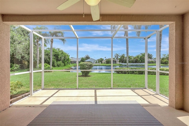 4539 Cabbage Key Ter, Bradenton, FL 34203 - unfurnished sunroom featuring a water view and a ceiling fan