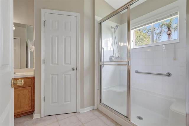 4539 Cabbage Key Ter, Bradenton, FL 34203 - full bathroom with tile patterned floors, a shower stall, and vanity