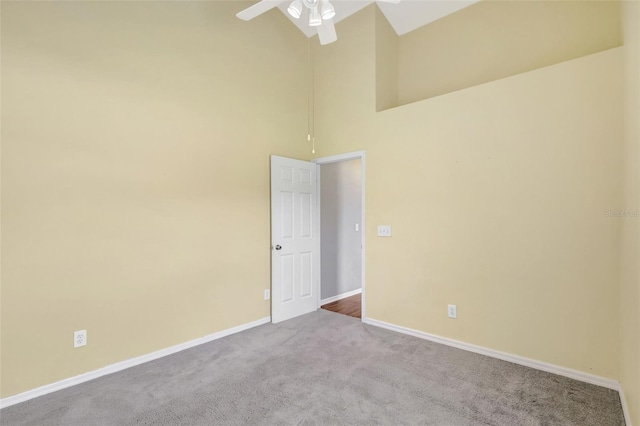 4539 Cabbage Key Ter, Bradenton, FL 34203 - empty room with carpet flooring, a ceiling fan, and a towering ceiling