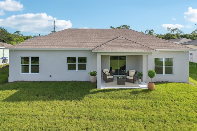 5534 Fairlane Dr, North Port, FL 34288 - back of house featuring stucco siding, outdoor lounge area, a lawn, a patio, and a shingled roof