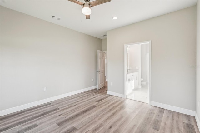 5534 Fairlane Dr, North Port, FL 34288 - unfurnished bedroom featuring light wood-style floors, recessed lighting, ensuite bath, and ceiling fan