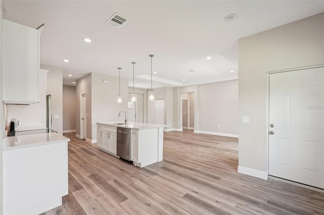 5534 Fairlane Dr, North Port, FL 34288 - kitchen with white cabinetry, light countertops, light wood-style flooring, recessed lighting, and stainless steel dishwasher
