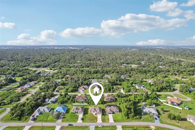 5534 Fairlane Dr, North Port, FL 34288 - aerial view of property and surrounding area with a heavily wooded area and nearby suburban area
