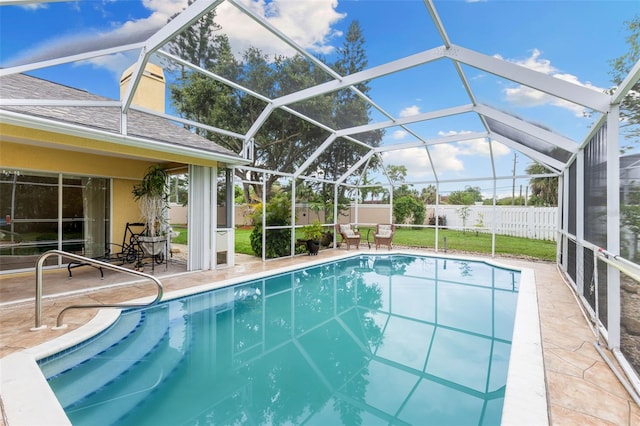 6118 56th Ter E, Bradenton, FL 34203 - view of pool featuring a patio area, a fenced backyard, and glass enclosure