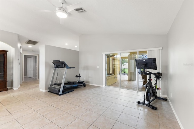6118 56th Ter E, Bradenton, FL 34203 - exercise area with vaulted ceiling, a ceiling fan, light tile patterned flooring, arched walkways, and recessed lighting