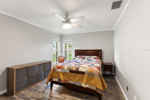 6118 56th Ter E, Bradenton, FL 34203 - bedroom featuring wood finished floors, ornamental molding, and a ceiling fan
