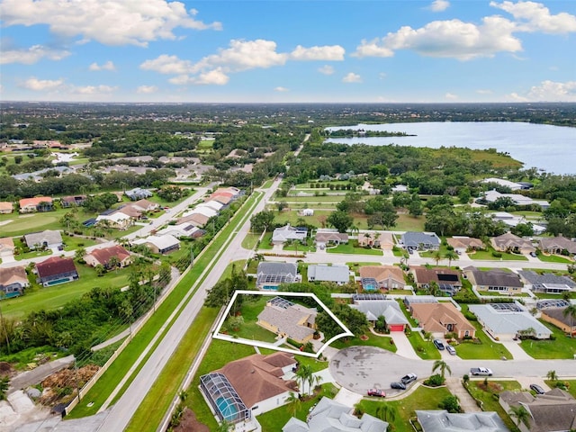 6118 56th Ter E, Bradenton, FL 34203 - aerial view of property and surrounding area with nearby suburban area and property parcel outlined
