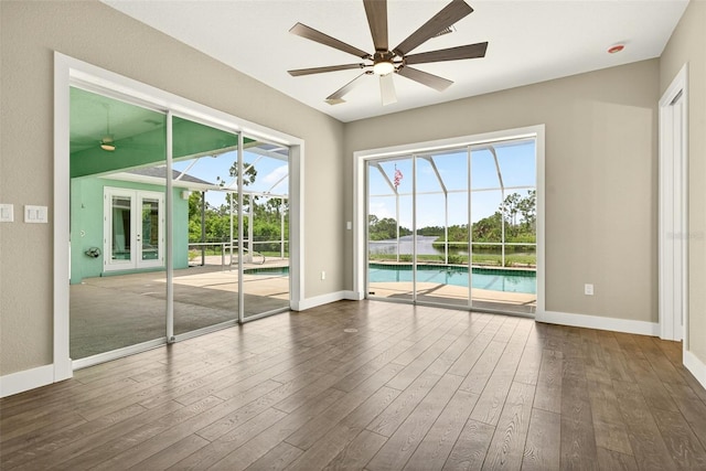 2555 Pear St, Port Charlotte, FL 33948 - spare room featuring ceiling fan and dark wood-type flooring