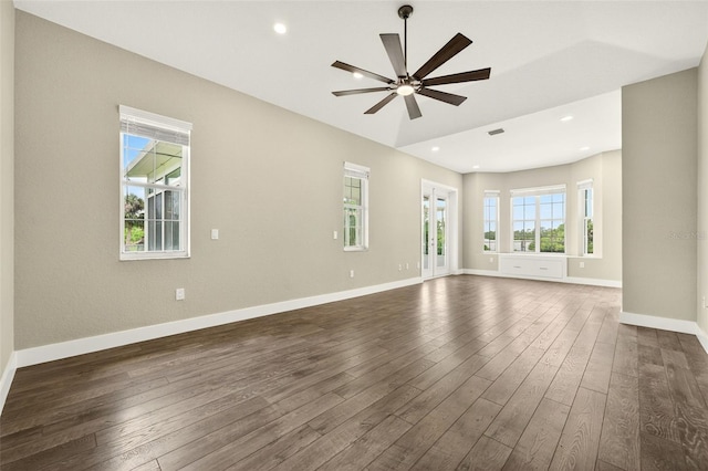2555 Pear St, Port Charlotte, FL 33948 - spare room featuring dark wood-style flooring, a ceiling fan, and recessed lighting