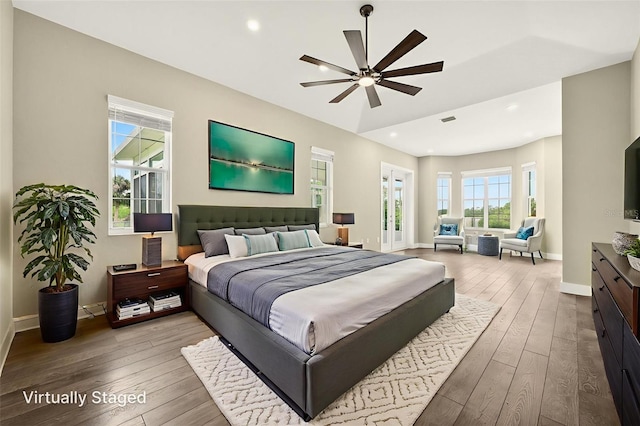 2555 Pear St, Port Charlotte, FL 33948 - bedroom with hardwood / wood-style flooring, recessed lighting, and a ceiling fan