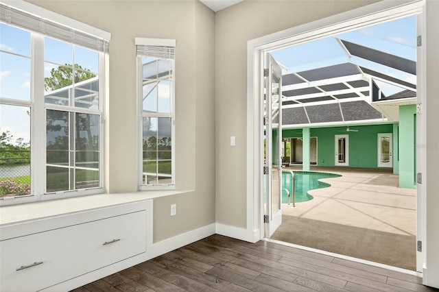 2555 Pear St, Port Charlotte, FL 33948 - entryway featuring hardwood / wood-style flooring and baseboards