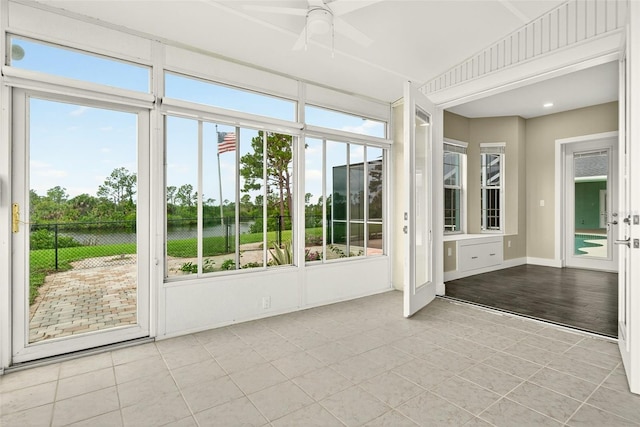 2555 Pear St, Port Charlotte, FL 33948 - unfurnished sunroom with tile patterned flooring, healthy amount of natural light, and french doors