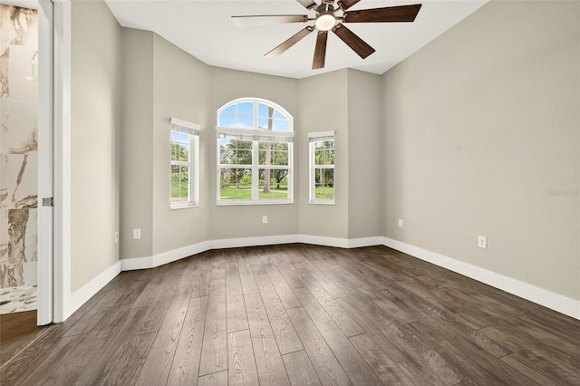 2555 Pear St, Port Charlotte, FL 33948 - empty room featuring dark wood finished floors and a ceiling fan