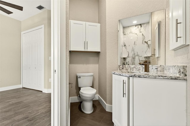 2555 Pear St, Port Charlotte, FL 33948 - full bath featuring vanity, a ceiling fan, and a marble finish shower