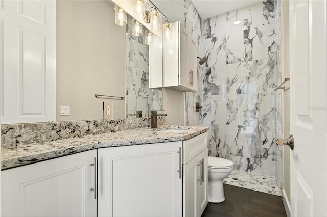 2555 Pear St, Port Charlotte, FL 33948 - bathroom featuring double vanity and a marble finish shower