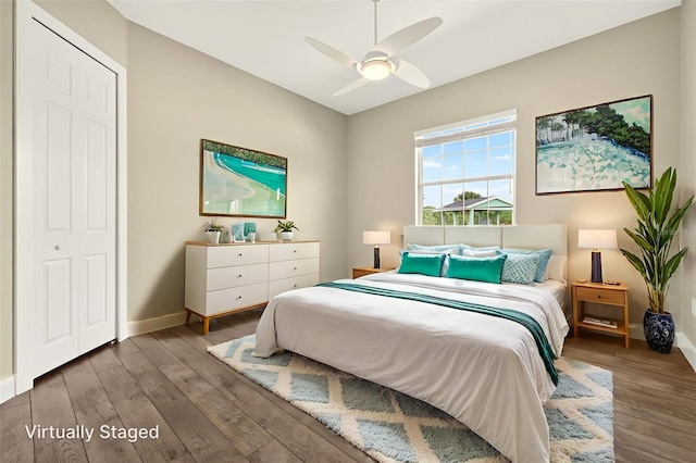 2555 Pear St, Port Charlotte, FL 33948 - bedroom with wood finished floors and a ceiling fan