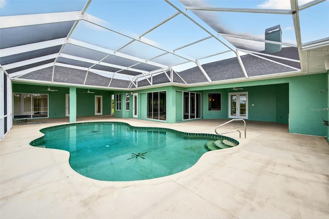 2555 Pear St, Port Charlotte, FL 33948 - swimming pool with a ceiling fan, a patio, french doors, and a lanai