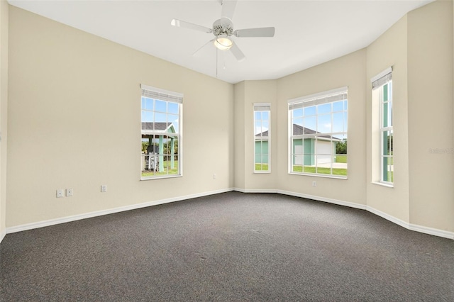 2555 Pear St, Port Charlotte, FL 33948 - spare room with dark carpet and a ceiling fan