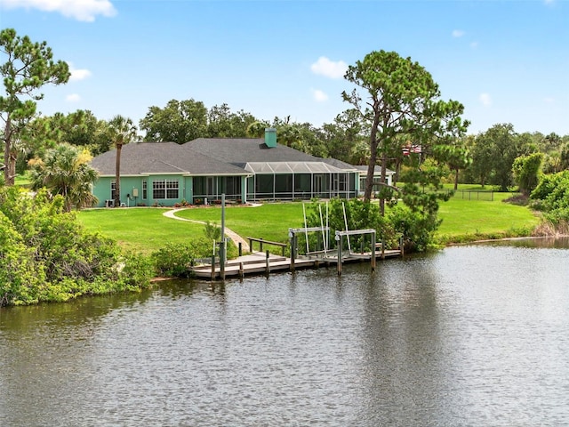 2555 Pear St, Port Charlotte, FL 33948 - dock area with a water view, a lawn, and glass enclosure