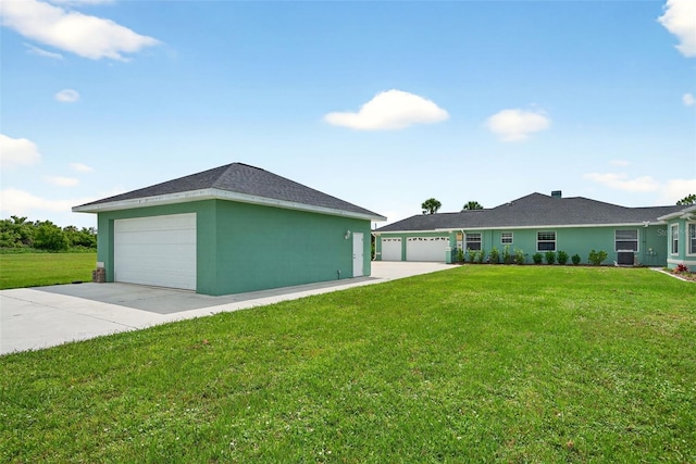 2555 Pear St, Port Charlotte, FL 33948 - view of front of property with a front lawn, driveway, and stucco siding