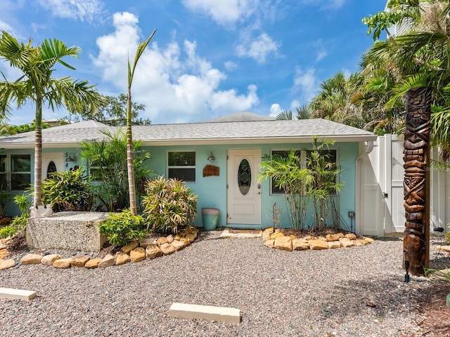 544 Canal Rd, Sarasota, FL 34242 - ranch-style home featuring a gate and roof with shingles