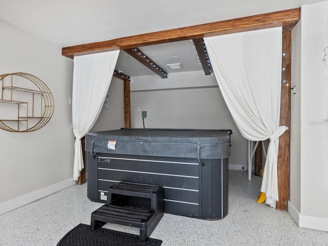 544 Canal Rd, Sarasota, FL 34242 - detailed view of speckled floor and baseboards