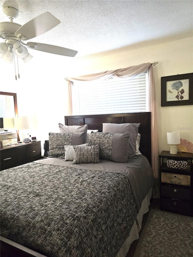 1903 4th Ave W, Palmetto, FL 34221 - bedroom with a ceiling fan and a textured ceiling