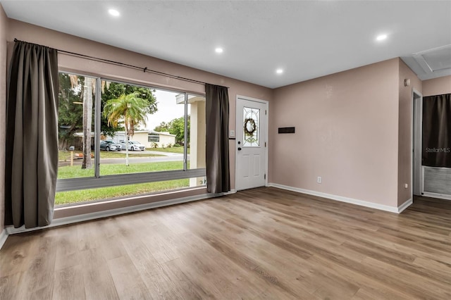 6439 Lafayette Rd, Bradenton, FL 34207 - foyer entrance featuring wood finished floors and recessed lighting