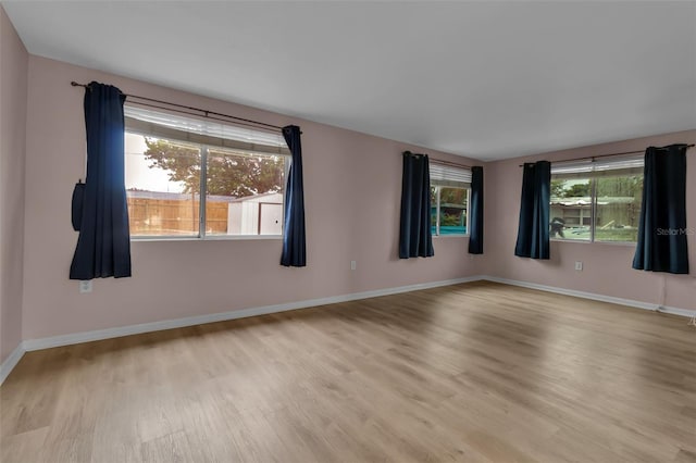 6439 Lafayette Rd, Bradenton, FL 34207 - spare room with light wood-style flooring and baseboards