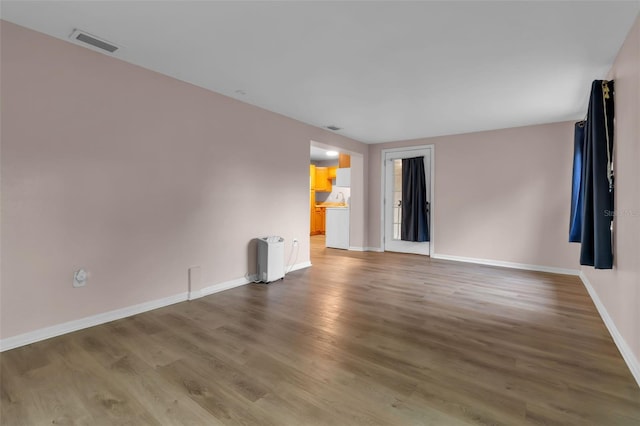 6439 Lafayette Rd, Bradenton, FL 34207 - spare room with wood finished floors and baseboards