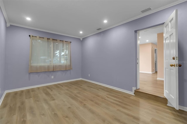 6439 Lafayette Rd, Bradenton, FL 34207 - unfurnished room with ornamental molding, wood finished floors, and recessed lighting