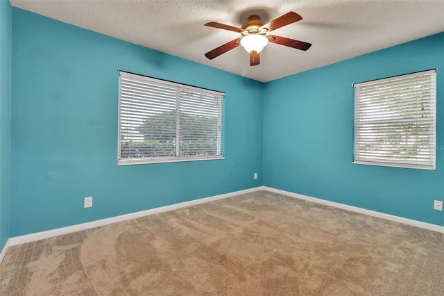 6439 Lafayette Rd, Bradenton, FL 34207 - carpeted spare room with a ceiling fan and a textured ceiling