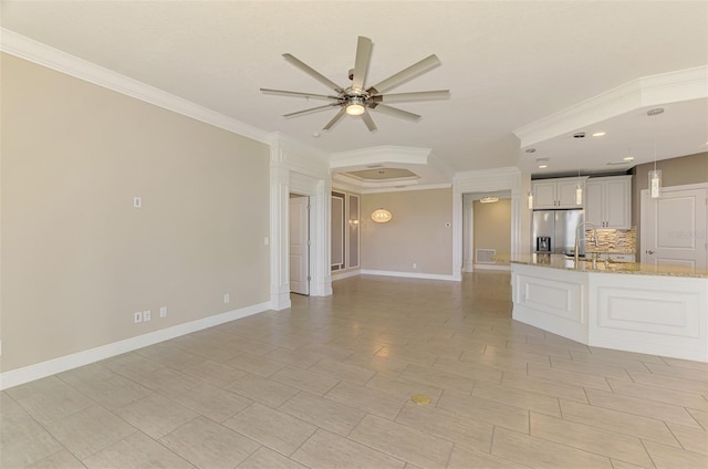1226 Riverscape St, Bradenton, FL 34208 - unfurnished living room featuring a ceiling fan, crown molding, and recessed lighting