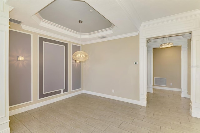 1226 Riverscape St, Bradenton, FL 34208 - empty room featuring ornate columns, crown molding, and a tray ceiling