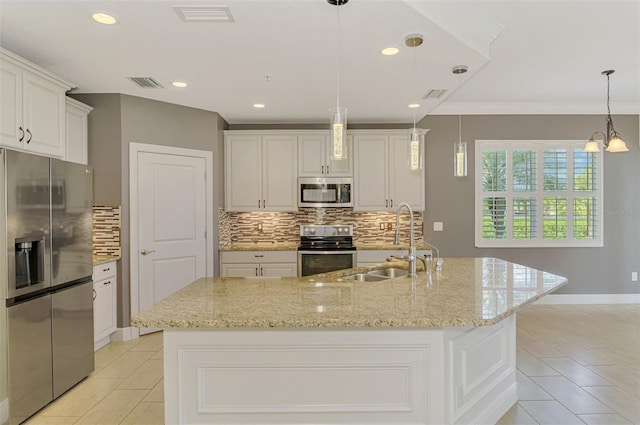 1226 Riverscape St, Bradenton, FL 34208 - kitchen featuring appliances with stainless steel finishes, light tile patterned floors, decorative backsplash, light stone counters, and recessed lighting