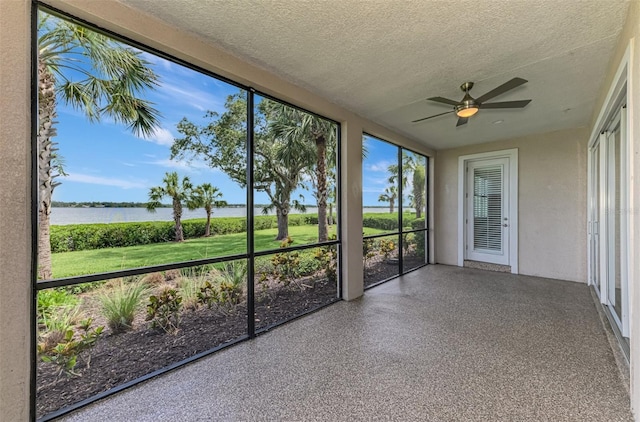 1226 Riverscape St, Bradenton, FL 34208 - unfurnished sunroom with a water view and ceiling fan