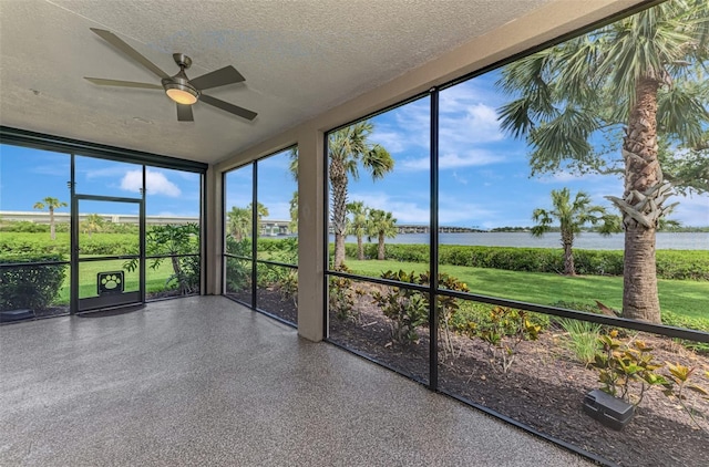 1226 Riverscape St, Bradenton, FL 34208 - unfurnished sunroom featuring a water view and a ceiling fan