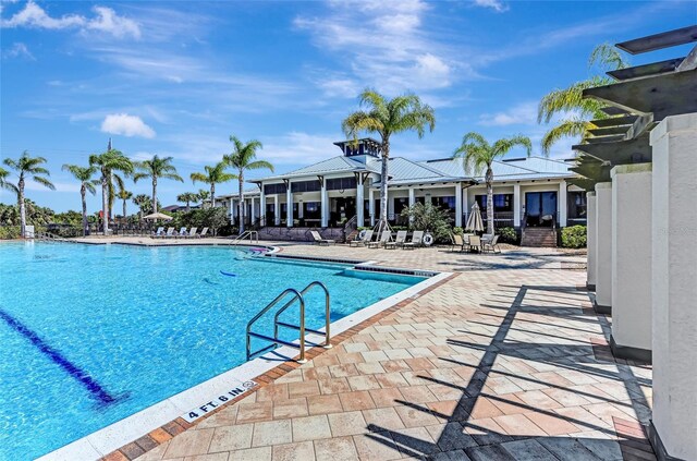 1226 Riverscape St, Bradenton, FL 34208 - community pool featuring a patio area