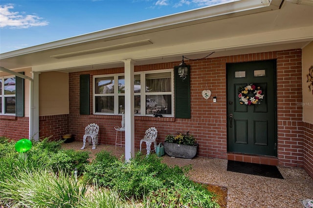 1907 76th St NW, Bradenton, FL 34209 - property entrance with brick siding and a porch