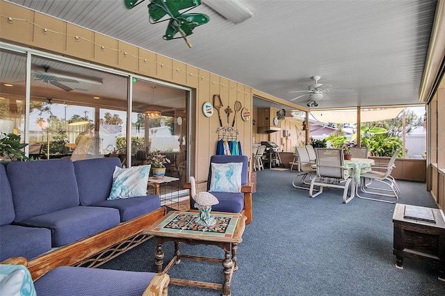 1907 76th St NW, Bradenton, FL 34209 - sunroom featuring ceiling fan, outdoor lounge area, and outdoor dining space