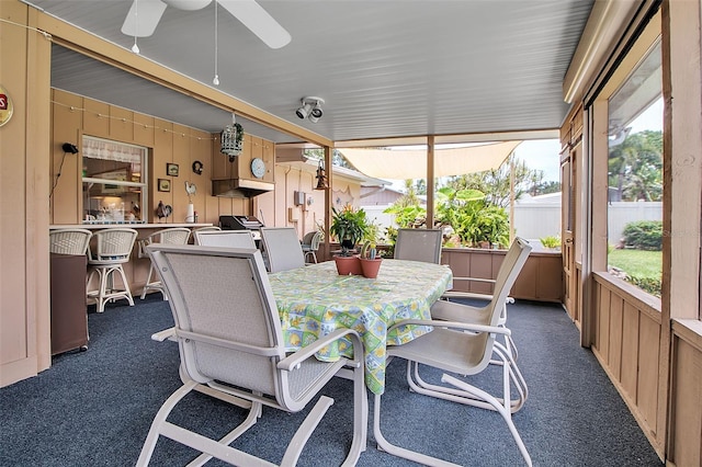 1907 76th St NW, Bradenton, FL 34209 - sunroom featuring a ceiling fan and outdoor dining space