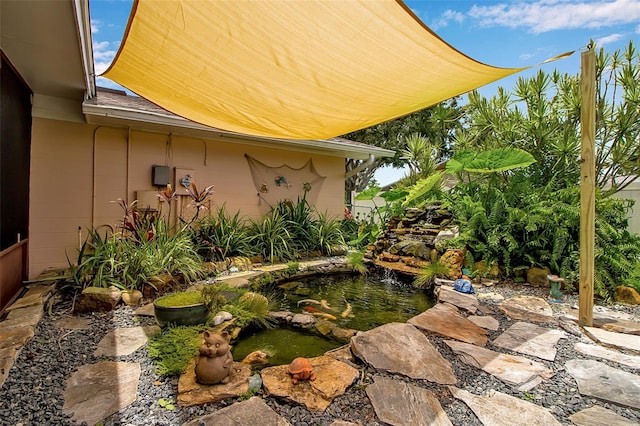 1907 76th St NW, Bradenton, FL 34209 - view of yard featuring a small pond