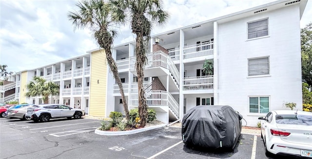 5948 Easy St Unit K35, Bradenton, FL 34207 - view of apartment building / complex featuring uncovered parking